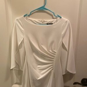 Never worn, white DKNY dress. Perfect for rehearsal dinner or bridal shower!